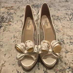 Valentino white lace shoes with a satin heel